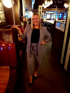 General Manager Lauren Klempay standing in restaurant