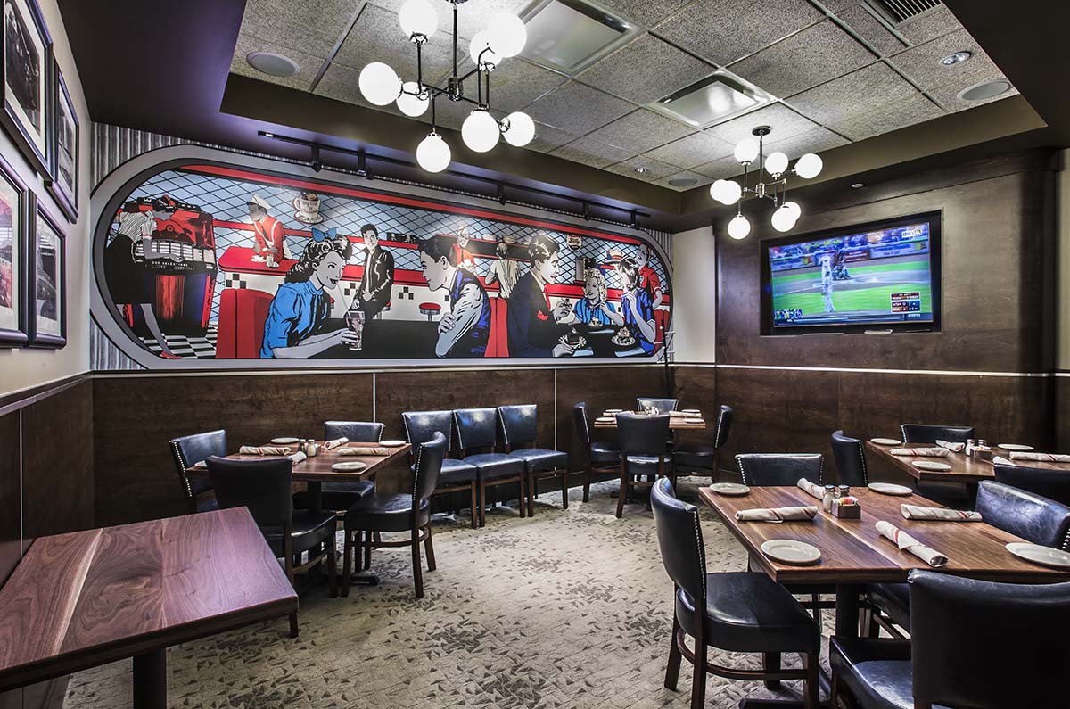 Private dining room set for guests at Cap City Fine Diner in Dublin, Ohio at Bridge Park.